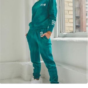 Peloton + Spiritual Gangster never knocked out sweatshirt and sweatpants